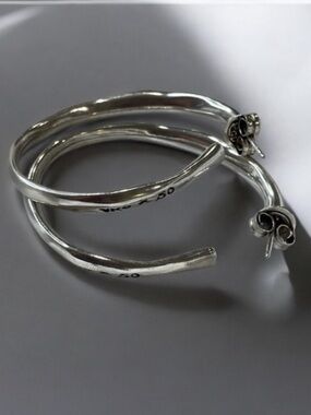 UNO de 50 Silver Spiral Hoop Earrings